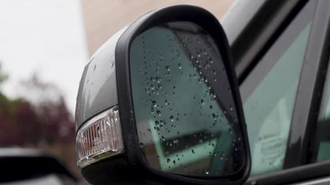 Video using the blinker light on the side mirror of a car. Stock Footage 345066636