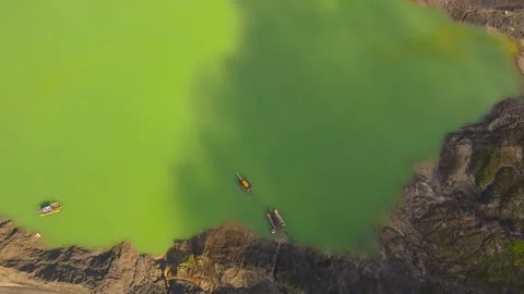Video using a drone over a coal mining pool in east kalimantan Stock Footage 170301545