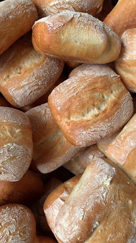 Video of various ciabatta breads in a bakery. Food and industry concept. Stock Footage 262344616