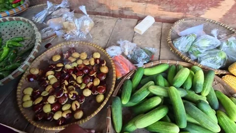 Video of Vibrant vegetables fill a bustling market stall. Stock Footage 341378212