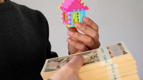 A video that visualizes buying a house Stock Footage 324546448