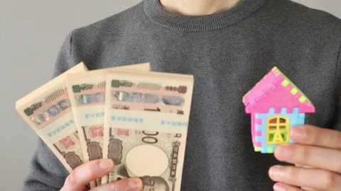 A video that visualizes paying off a home loan Video stock 324546389