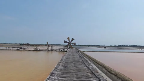 Video walking forward slowly on a bamboo bridge towards a traditional. Stock Footage 340161049