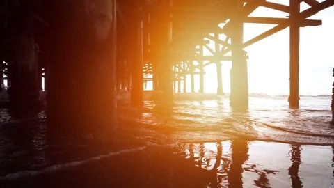 Video of walking under pier in real slow motion Video stock 77283019