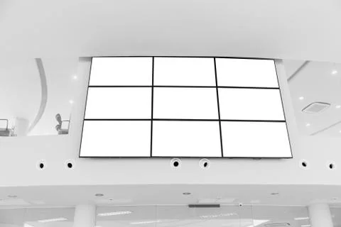 Video wall LED screen array billboard setup installation indoor office hall Stockfoto's