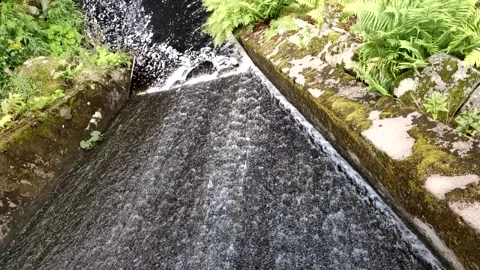Video of water running down small waterfall in the Alsace region Video stock 152606343