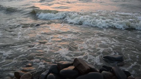 The video of the waves of sea. Out focus. Natural sea stones close-up. Stock Footage 94519265