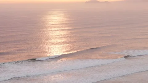 Video of the waves of the sea (Pacific Ocean in Lima, Peru) at sunset. Stock Footage 236274553