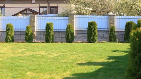 Video of a well-kept plot near the house. Stock-Footage 129834287