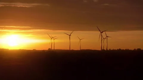Video of windmills at the sunset in real slow motion Stock Footage 79289007