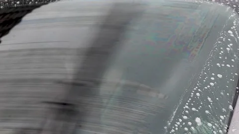 Video windshield wipers cleaning car windshield. Stock Footage 341681650