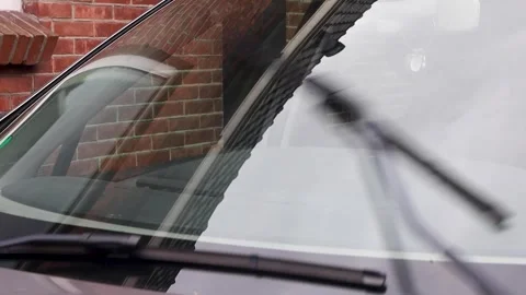Video of windshield wipers in motion on a car. Stock Footage 341681820