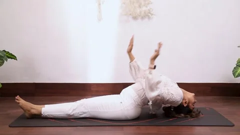 Video of woman performing Matsyasana 스톡 동영상 242067427