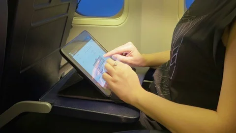 Video of woman using digital tablet in 4K Stock Footage 75848316
