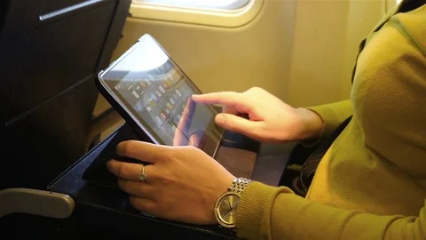 Video of woman using digital tablet in 4K Stock Footage 77262963