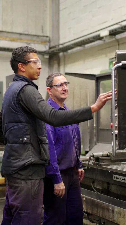 Video of workers using a control panel in the factory 스톡 동영상 257627200