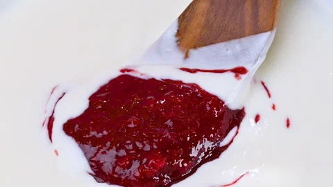 Video of yogurt with raspberry jam Stock Footage 331791045