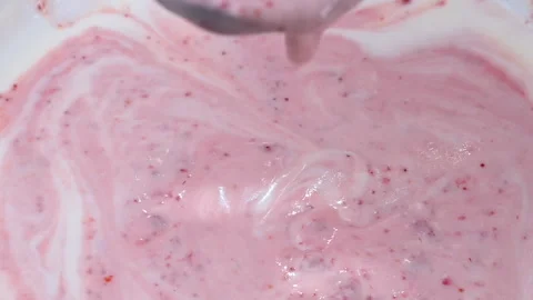 Video of yogurt with raspberry jam Stock Footage 331791347