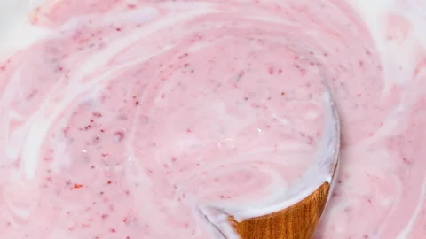 Video of yogurt with raspberry jam Stock Footage 331791385