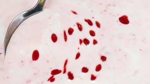 Video of yogurt with raspberry jam Stock Footage 331791432