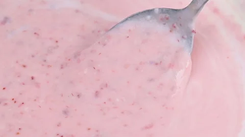 Video of yogurt with raspberry jam Stock Footage 331791478