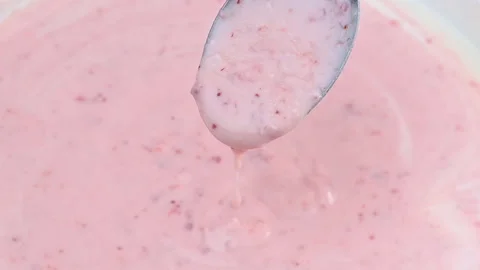 Video of yogurt with raspberry jam Stock Footage 331791481