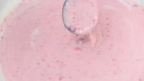 Video of yogurt with raspberry jam Stock Footage 331791508