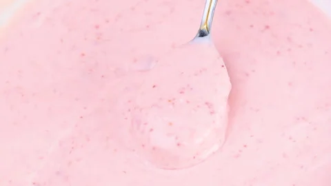Video of yogurt with raspberry jam Stock Footage 331791553