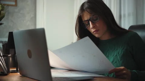 Video of a young financial advisor analyzing economic crisis charts with stress  Stock Footage 346329174