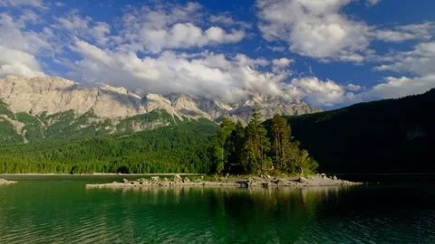 Video of Zugspitze mountain range and Eibsee lake island in Bavaria Germany Stock Footage 332023534