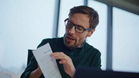 Videocalling entrepreneur explaining project to webcam laptop in office closeup. Stock Footage 340298541