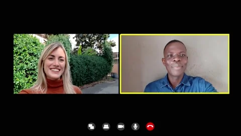 Videochat, technology - smiling black man talks to his beautiful friend 스톡 동영상 141917275