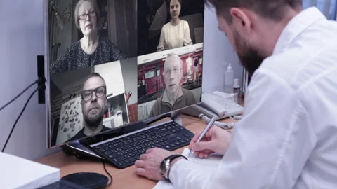 Videoconference of a doctor with patients. Stock Footage 130491875