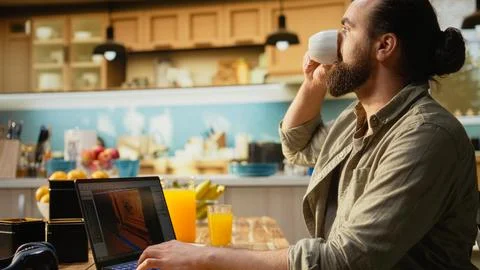 Videogame developer testing game assets and visual effects at home Stock Photos