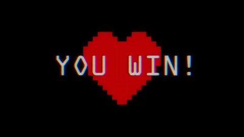 Videogame YOU WIN text heart on old computer tv glitch interference noise screen Stock Footage 83746069