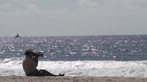 Videographer on the beach Video stock 46809000