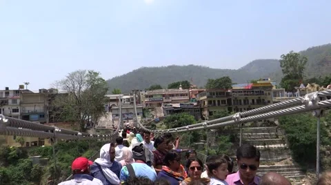 Videographer with camer on Laxman Jhula, Rishikesh Stock-Footage 60934572