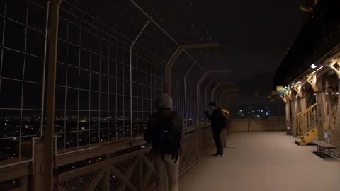 Videographer in the Eiffel Tower Stock Footage 146685988
