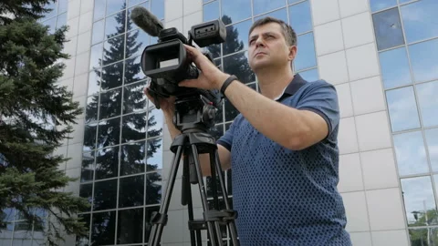 Videographer escapes from the set. A funny case on the set Stock Footage 94817692