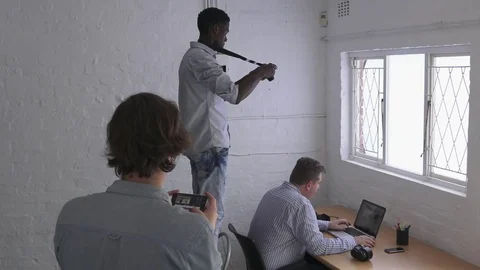 Videographer filming - May depict third Party IP Video stock 72921752