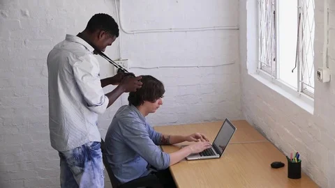 Videographer filming - May depict third Party IP Video stock 72921944
