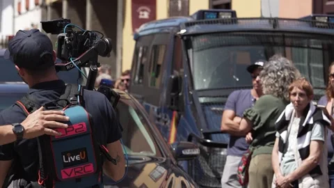 Videographer Filming Workers for Papal Visit Stock Footage 342297787