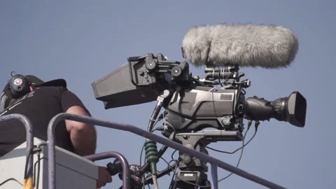 Videographer professional close-up. Static footage. Cameraman shoots a video of 動画素材 219788617