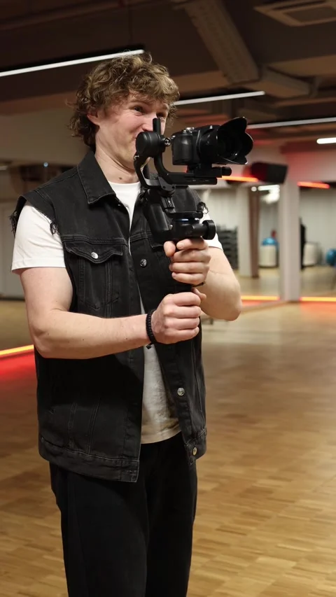 Videographer shocked during filming with camera on gimbal Stock Footage 332116644
