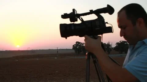 Videographer silhouette Stock Footage 21124238