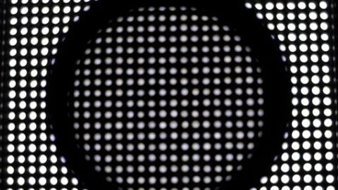 Videographer turning Neutral Density variable ND Filter. LED Light in background Stockbeeldmateriaal 119164417