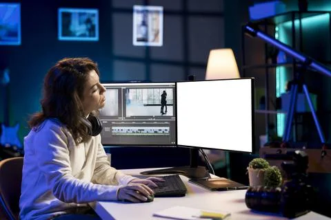Videographer using professional software on mockup PC to create visual effects Fotos de archivo