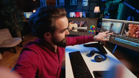 Videographer using selfie camera to record tutorial on how to use software to Stock Footage 257728506