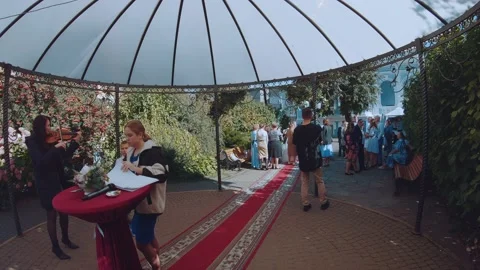 The videographer at the wedding turns off the camera Stock Footage 168621441