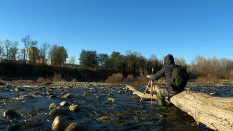 Videomaker in action in the middle of the stream Stock Footage 276172119